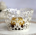 Elegant white laser cut lace cupcake wrapper with intricate floral pattern for weddings - Ivory