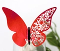 Detail of red laser-cut butterfly cup card with elegant floral hollow patterns for weddings - Reflective Bright Red