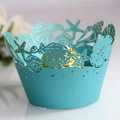 Tealfarbene Muffinförmchen mit Laser-Cut Meeresschnecken und Seesternen - Tiffany Blau