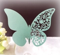 Laser cut butterfly place card in tiffany blue attached to glass rim for wedding decor - Sea Blue