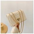 Chic cream heart-quilted crossbody bag with a golden heart-shaped clasp and chain strap - White