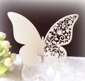 Elegant ivory butterfly place card with laser-cut floral wing for wedding wine glasses - Ivory