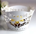 Detail of white laser-cut cupcake wrapper featuring 'It's a Girl' text and floral design - 5cm / White