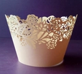 Detailed laser cut cream cupcake wrapper featuring intricate rose and leaf floral patterns - Jade Pearl
