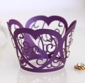 Detail of purple laser-cut cupcake wrappers with heart patterns for wedding decorations - Dark Purple