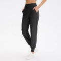 Women's black high-waisted loose yoga joggers with side pockets and cinched cuffs - 4/S / Bottoms / Black