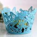 Laser cut light blue butterfly cupcake wrapper featuring intricate hollow patterns - Sky Blue