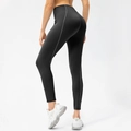 High-waisted black yoga leggings with grey contrast stitching and body-sculpting fit - 4/S / Black