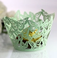 Pale green laser cut butterfly cupcake wrapper featuring fine hollow out paper design - Fruit Green