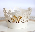 Close-up of laser-cut white floral paper cupcake wrappers with delicate lace crown details - 5*5*8CM / Ivory