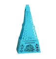 Detail of laser-cut Eiffel Tower sky blue paper candy box with intricate floral hollow patterns - Sky Blue