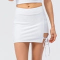 White ribbed tennis skirt with high waist design and side cutout bow tie detail - 2/XS / Bottoms / White