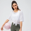 Haut de yoga blanc avec nœud devant et legging vert olive avec un ballon de yoga - 2/XS / Blanc