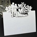 White laser-cut wedding table card featuring Mr & Mrs silhouettes and butterfly design - White