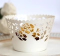 Elegant pearl white laser cut cupcake liners with intricate rose patterns for weddings - Ivory