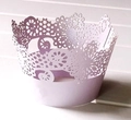 Detailed laser-cut lavender cupcake wrapper with intricate lace floral patterns on wood - Light Purple