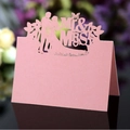 Pink laser-cut butterfly wedding place card featuring Mr & Mrs silhouettes for table decor - Pink