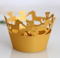Detailed laser-cut cupcake wrapper featuring golden carousel horses and cute bears - Gold