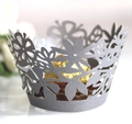 Macro shot of silver laser-cut cupcake wrapper with floral pattern and golden chocolate - 5cm / Silver Charcoal