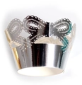 Macro detail of laser-cut silver bow lace wrapper with metallic reflective finish - Reflective Silver