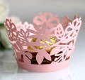 Detailed laser-cut pink flower paper cupcake wrapper holding a gold foil chocolate - 5cm / Pink