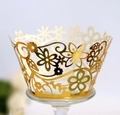 Elegant gold laser-cut floral cupcake wrappers for weddings and festive party decorations - Reflective Gold