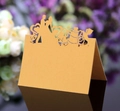Golden laser-cut wedding place card with couple silhouette and heart-shaped patterns - Gold Yellow