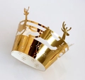 Golden laser-cut Christmas cupcake wrappers featuring reindeer and snowflake patterns - Reflective Gold