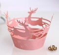 Pink laser cut cupcake wrappers with reindeer and snowflake patterns for Christmas - Pink
