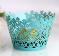 Macro detail of laser-cut tiffany blue cupcake wrapper with intricate floral and heart patterns - 5*5*8CM / Tiffany Blue