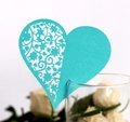 Teal laser-cut heart place card with floral patterns on a glass rim for weddings - Tiffany Blue