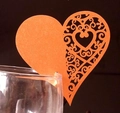 Detail of orange heart laser-cut paper wine glass card with elegant scroll patterns - Antique Bronze