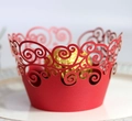 Macro detail of red laser-cut cupcake wrapper with elegant swirl patterns - 5cm / Red