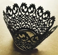 Intricate laser-cut black paper cupcake liners with vine and floral filigree patterns - Black Khaki