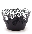 Detailed macro view of black laser cut cupcake wrappers with elegant swirl patterns - Black Khaki