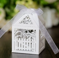 Laser-cut white wedding favor box in house shape with garden fence pattern and ribbon - White