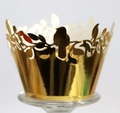 Macro detail of laser-cut gold bird and leaf pattern on cupcake paper wrappers - Reflective Gold; 5CM