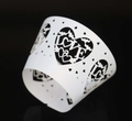 White laser-cut cupcake wrapper with heart patterns and LOVE text for party decor - White