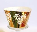 Detailed laser-cut gold cupcake wrapper featuring LOVE letters and heart shapes - Reflective Gold