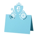 Detail of light blue laser-cut place card featuring a delicate pumpkin carriage design - Tiffany Blue