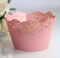 Close-up of pink laser-cut rose petal cupcake wrapper made of high-quality matte paper - Pink