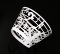 Laser-cut white cupcake wrapper featuring intricate musical notes and staff line design - White (WB-67)