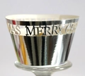 Macro detail of Merry Christmas hollow silver metal cake wrapper with mirror finish - 5*5*8CM / Reflective Silver