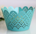Laser cut teal cupcake wrappers with floral patterns for wedding party decoration - Cyan