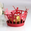 Close-up of red ballerina laser cut cupcake wrapper with a chocolate inside - Pearlescent Red