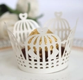 White laser cut cupcake wrappers with birdcage and heart motifs for wedding party decor - Ivory