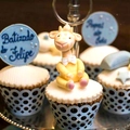 Detail of blue laser-cut lace cupcake wrapper with custom topper for party events - Light Blue Zircon