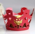 Macro detail of red laser-cut bear cupcake liners with heart hollows for chocolates - Pearlescent Red