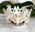 Detailed macro view of laser-cut ivory butterfly paper cupcake and chocolate wrapper - 5*5*8CM / Ivory