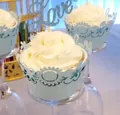 Detailed laser-cut light blue cupcake wrapper with elegant floral patterns and Love topper - Light Blue
